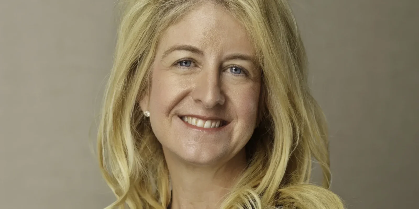 A smiling headshot of Natasha Deckman.