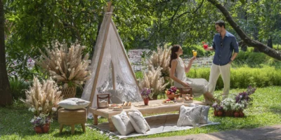 A couple at a glamping site.