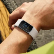 man wears a Fitbit 6
