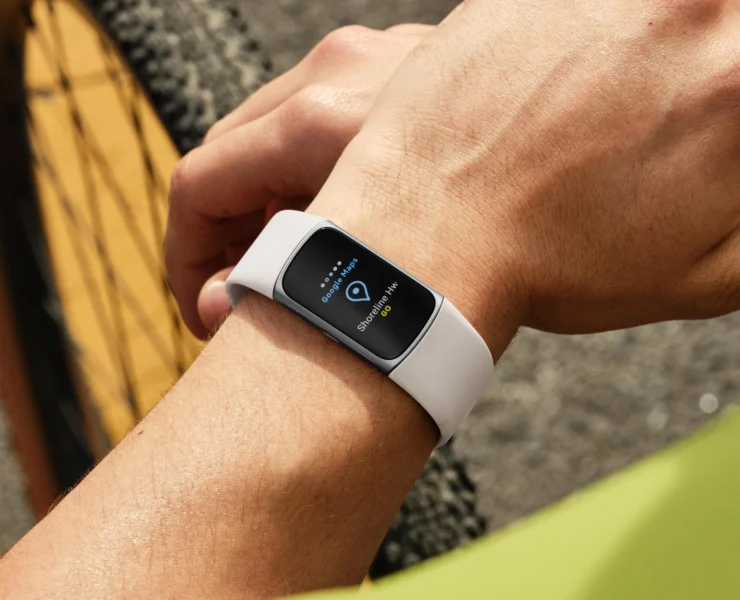 man wears a Fitbit 6