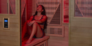 woman sitting in sauna