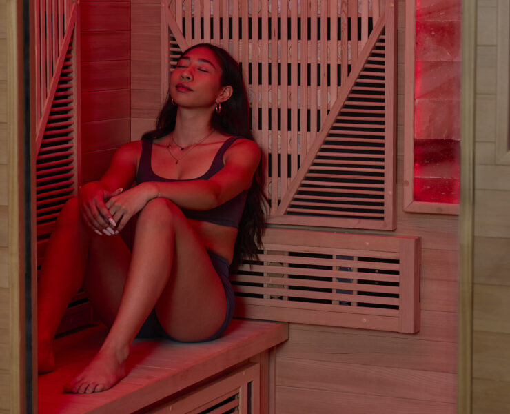woman sitting in sauna