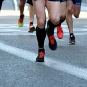 people running on pavement