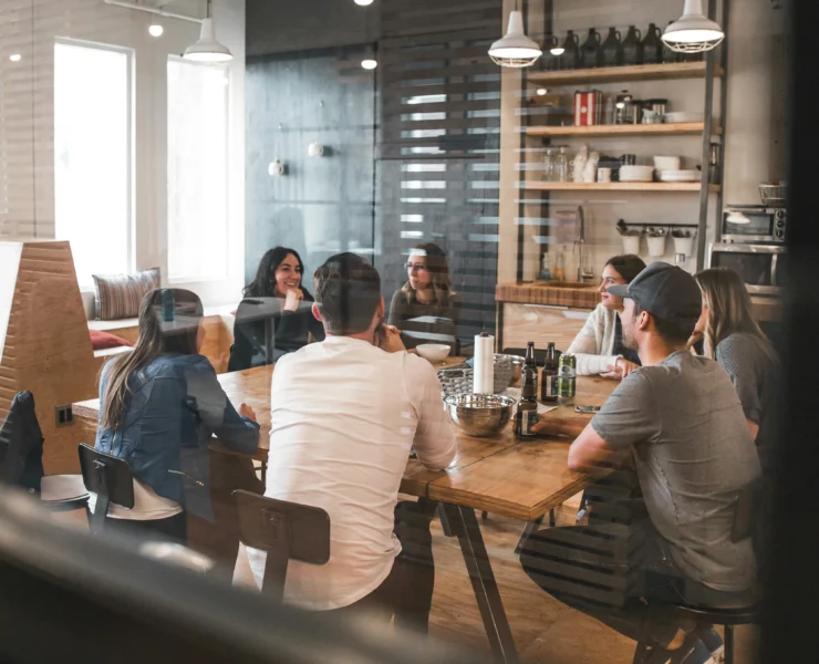 People at work in a staff meeting.