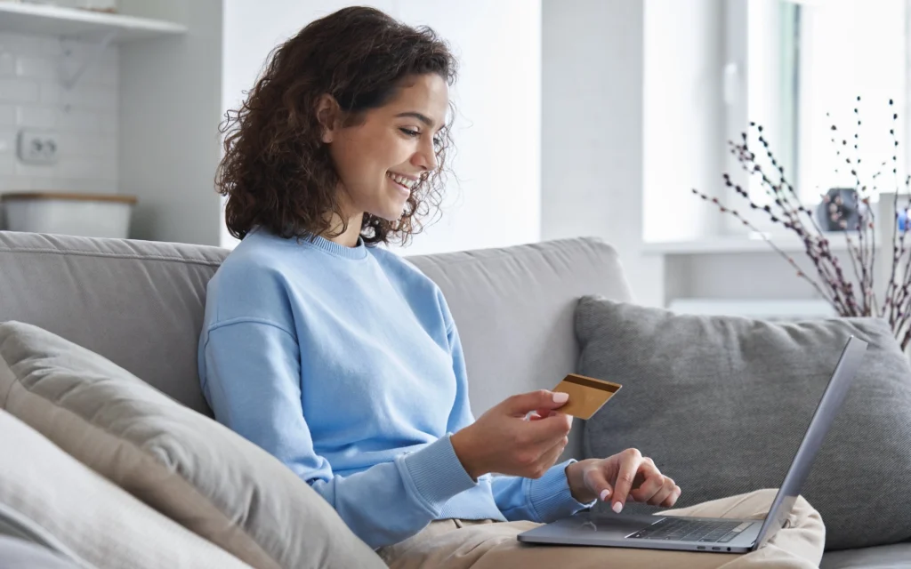 woman enters credit card details online