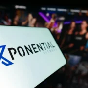 phone shows an Xponential Fitness logo