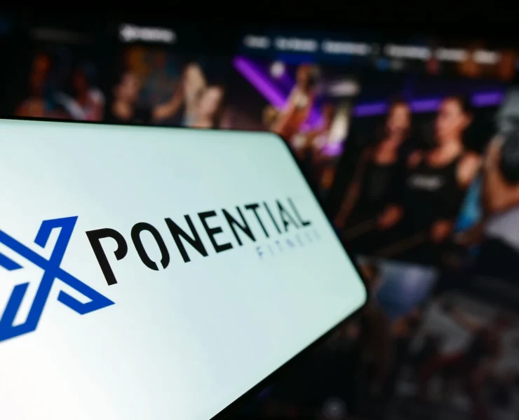 phone shows an Xponential Fitness logo