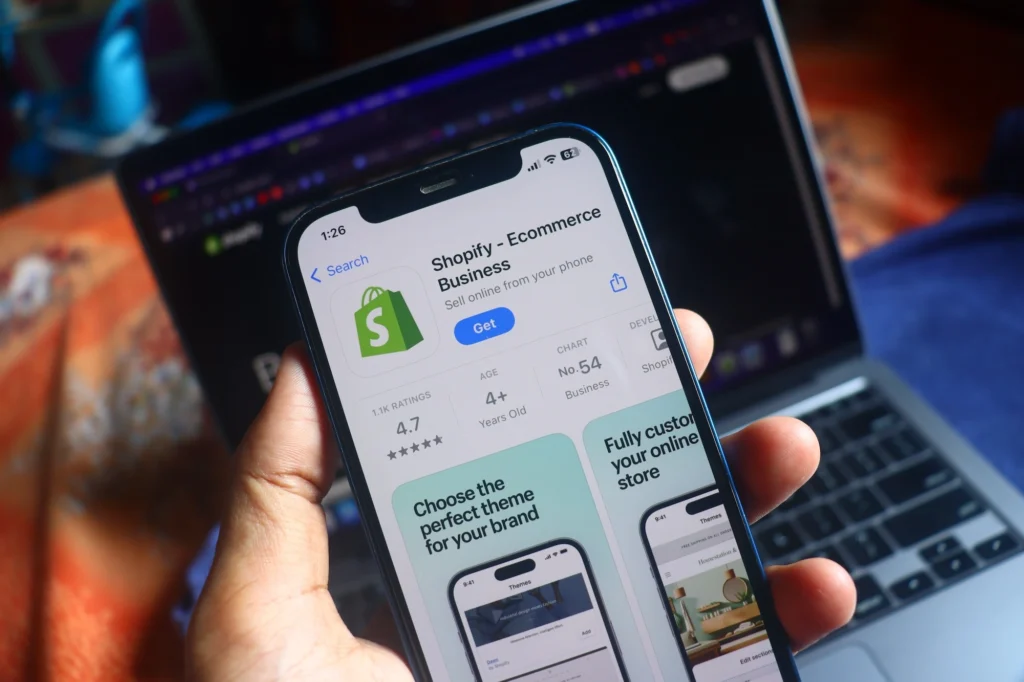 smart phone with a Shopfiy logo