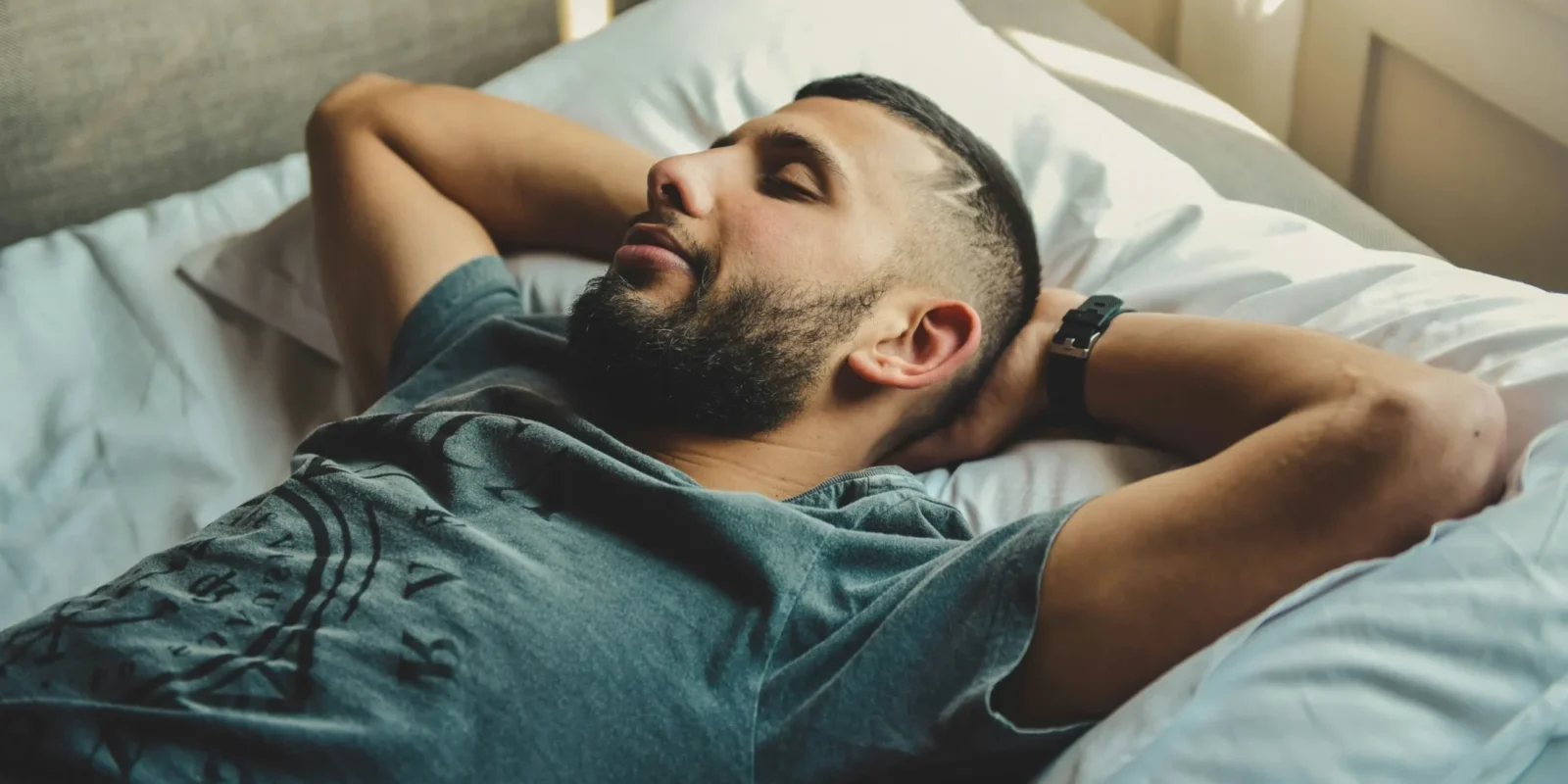 man in bed sleeping
