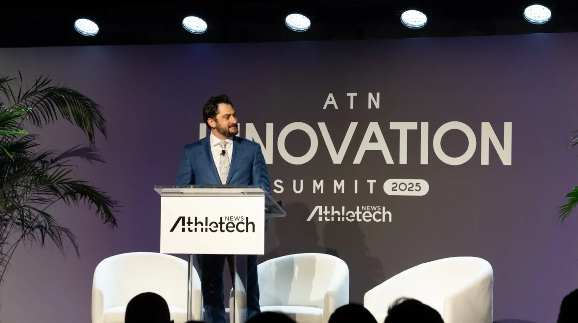 Edward Hertzman speaks on stage