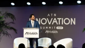 Edward Hertzman speaks on stage