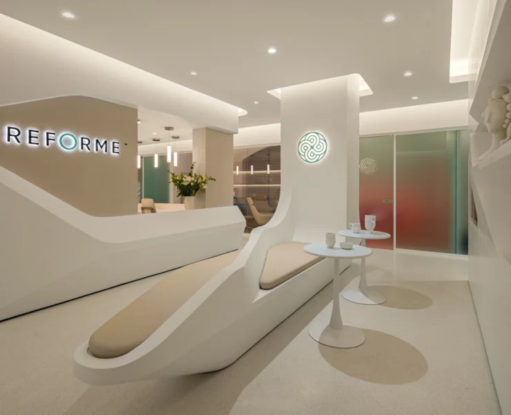 The whit interior of Reforme, a new wellness studio in NYC.