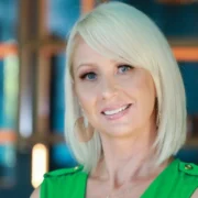 A smiling headshot of Robin Ruiz of the Wellness Tourism Association (WTA)