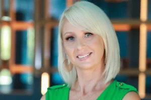 A smiling headshot of Robin Ruiz of the Wellness Tourism Association (WTA)