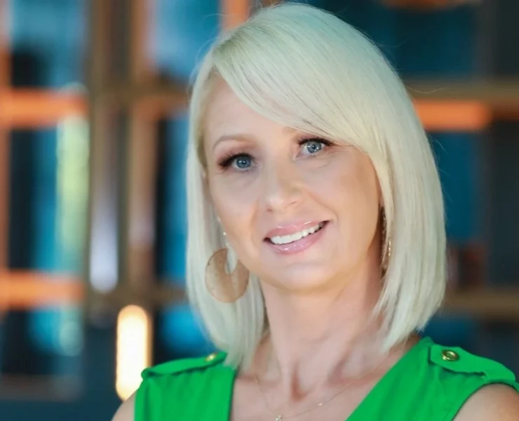 A smiling headshot of Robin Ruiz of the Wellness Tourism Association (WTA)