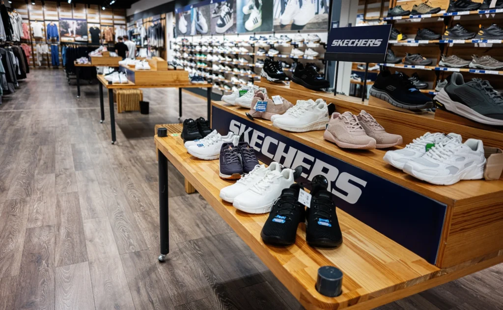 Sketchers sneakers displayed inside a retail store