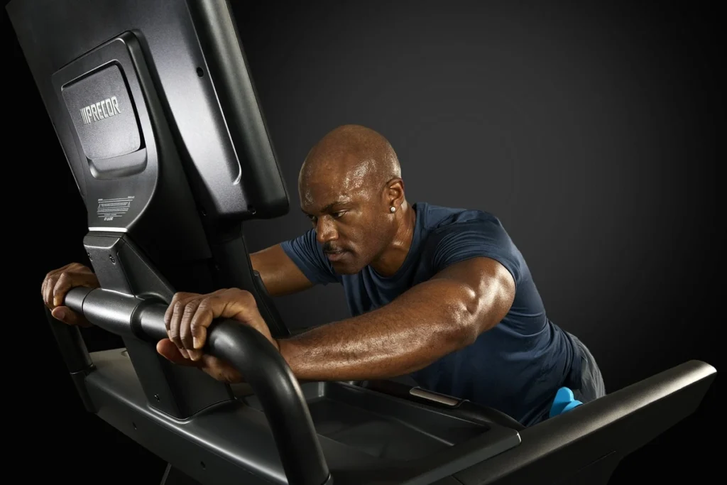 man uses sled mode on the Precor Breakaway treadmill
