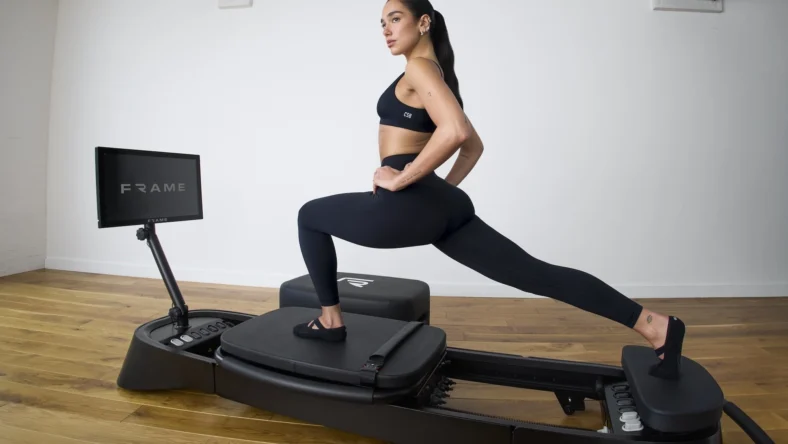 Dua Lipa on a Frame Fitness Pilates reformer