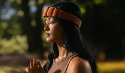 woman wears a Somnee headband