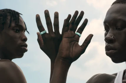 man and woman wear the ceramic Oura Ring 4