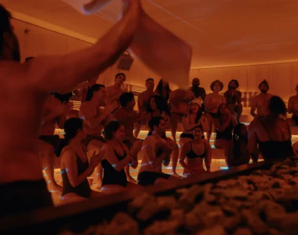 People inside an Othership sauna