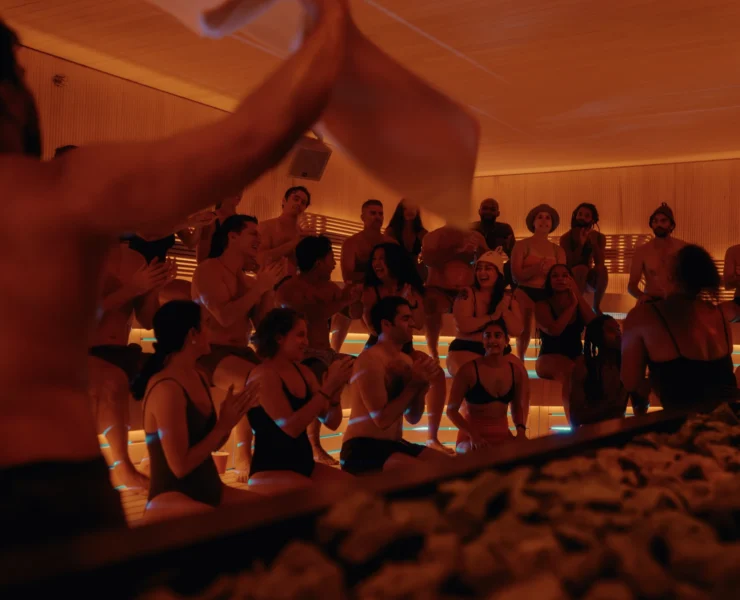 People inside an Othership sauna