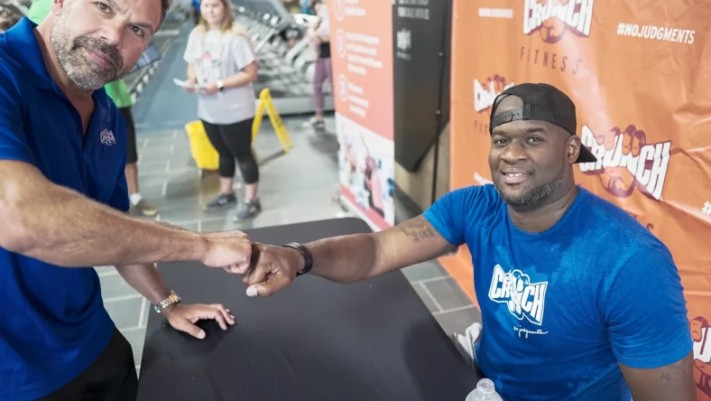 Undefeated Tribe CEO, Tony Hartl and Football Legend, Vince Young.