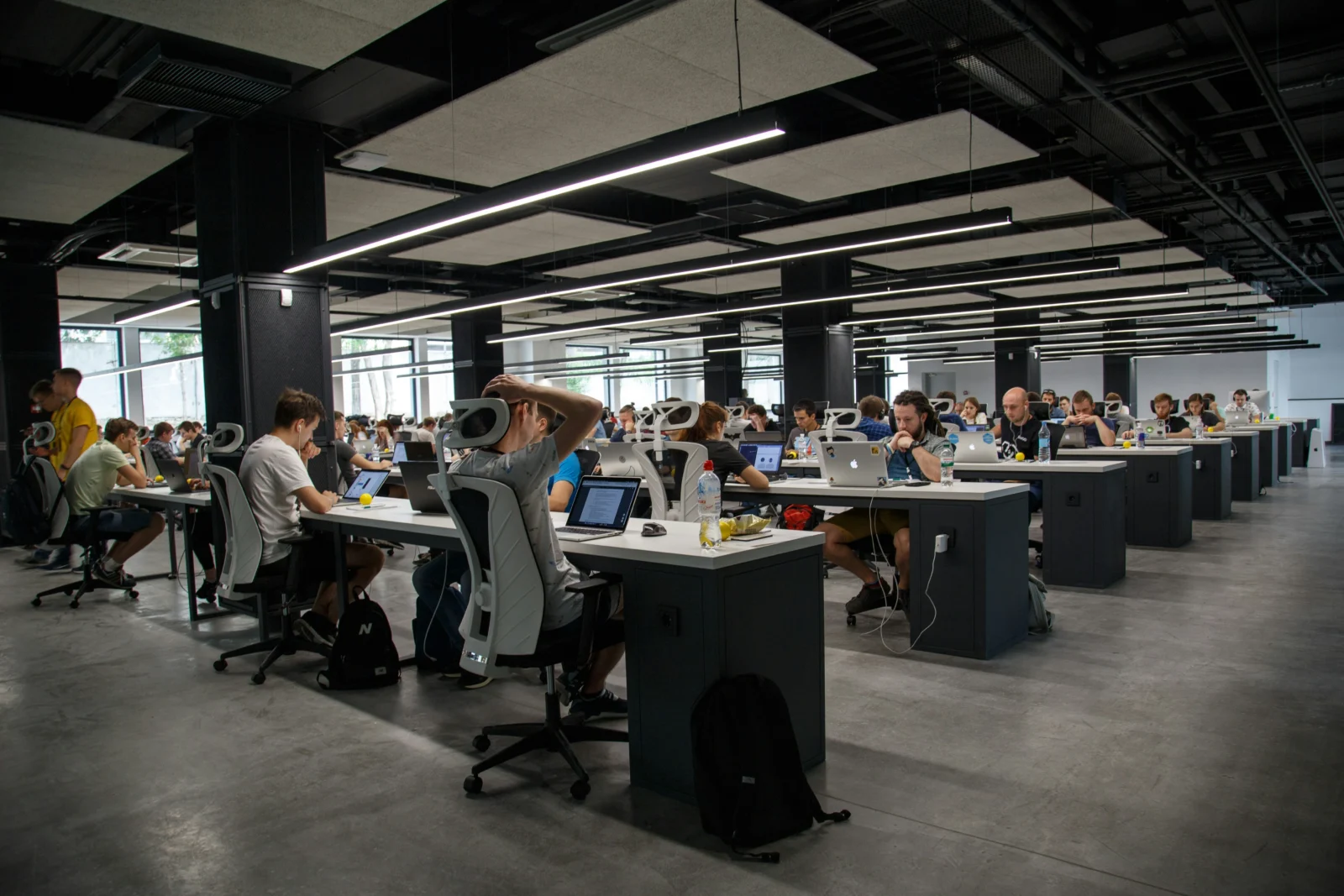 corporate office with employees sitting at desks