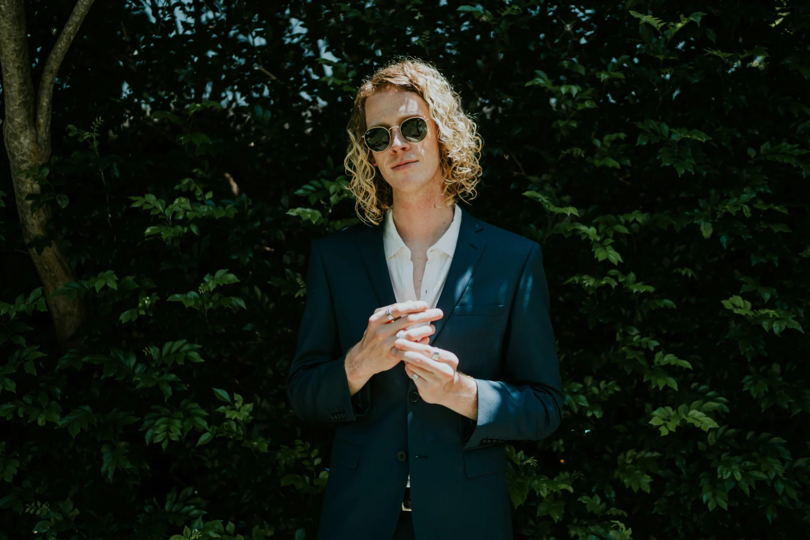 man in a suit wears a smart ring