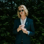 man in a suit wears a smart ring