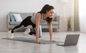 woman works out while streaming a fitness class