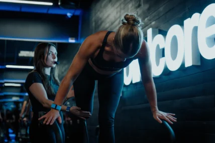 woman on a reformer in a Solidcore class