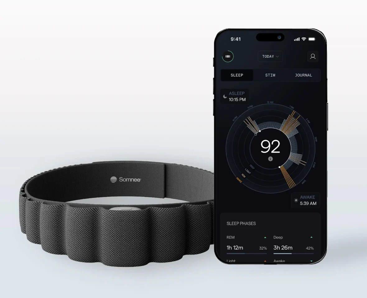 Somnee headband next to a smartphone