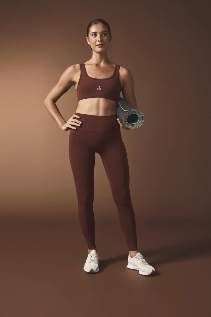 woman wears Figs x Set Active clothing