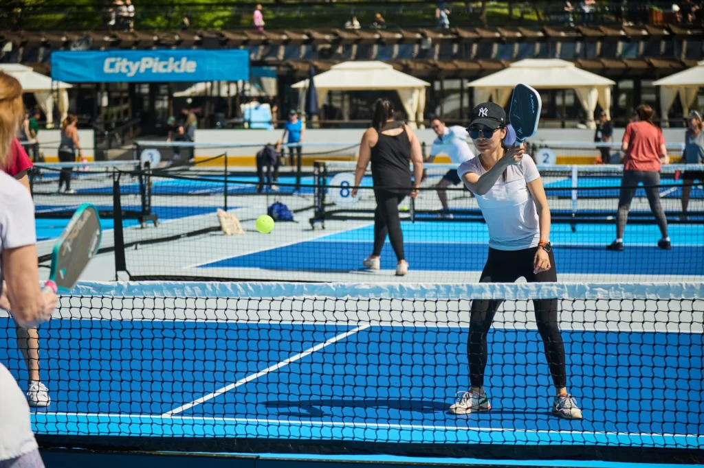 people play pickleball outside
