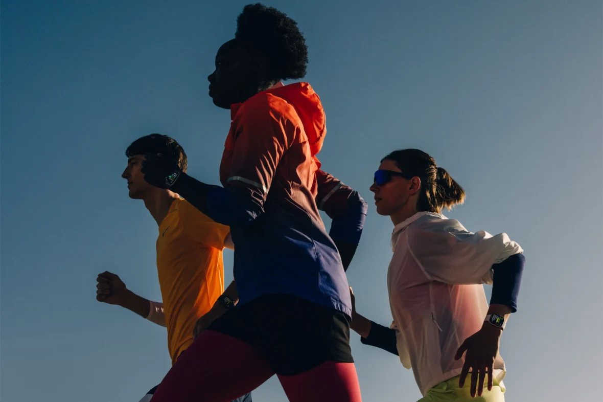 people run wearing Apple Watches