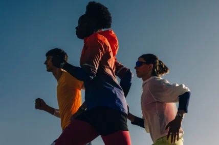 people run wearing Apple Watches