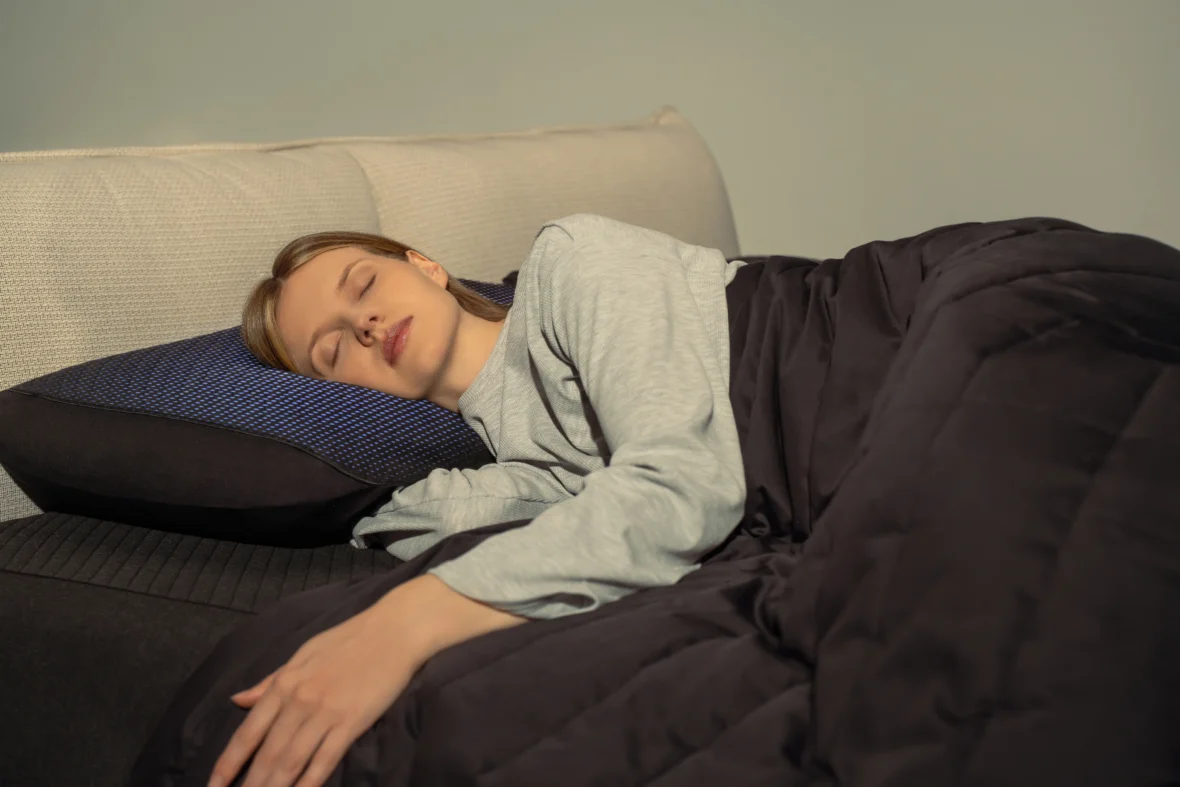 woman lays on an Eight Sleep pillow cover