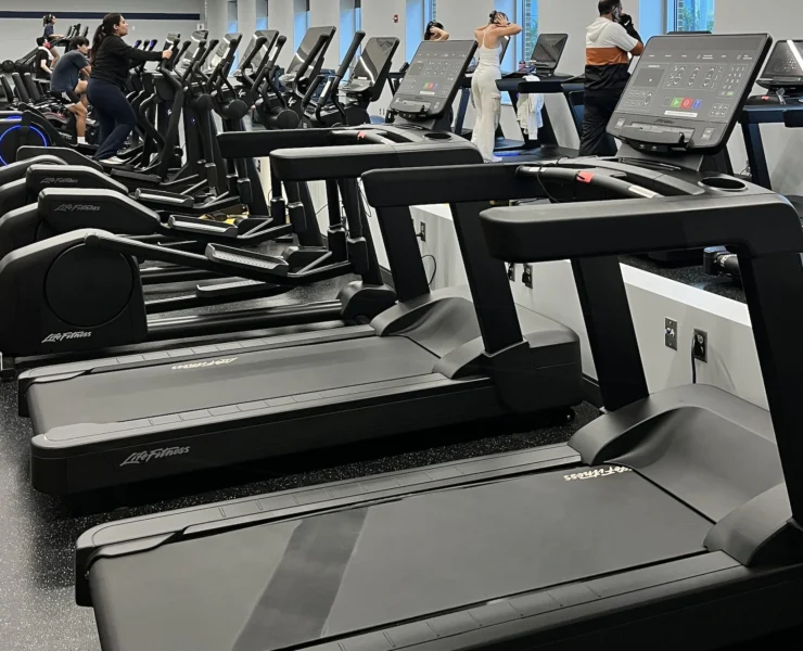 Life Fitness treadmills inside a college gym