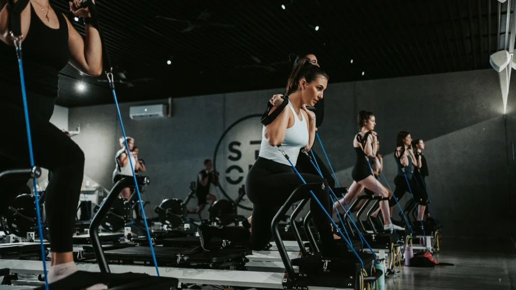 woman works out in a Strong Pilates