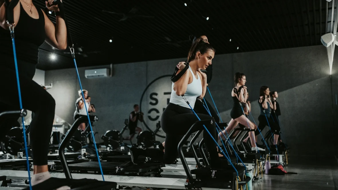 woman works out in a Strong Pilates