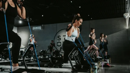 woman works out in a Strong Pilates