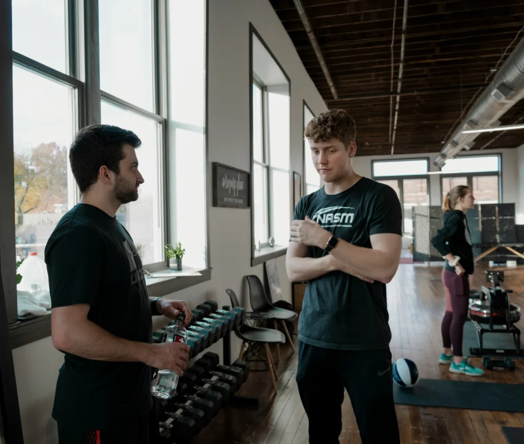 personal trainer with a client