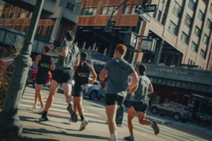 runners race through the streets of NYC