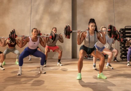 people work out in a Les Mills class