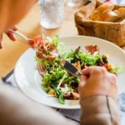 woman eats a sald