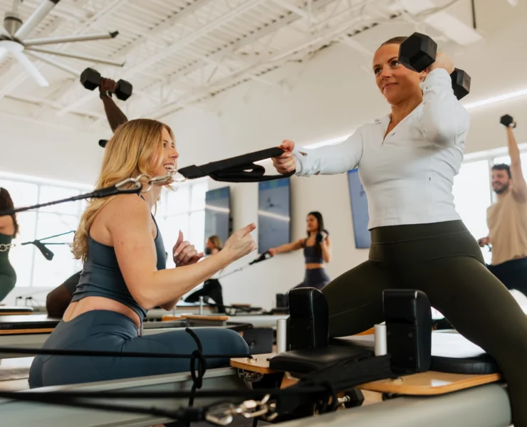 people work out in a fitness studio