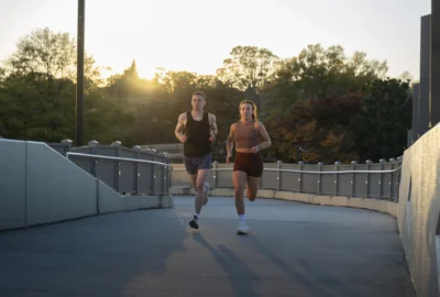 man and woman run together