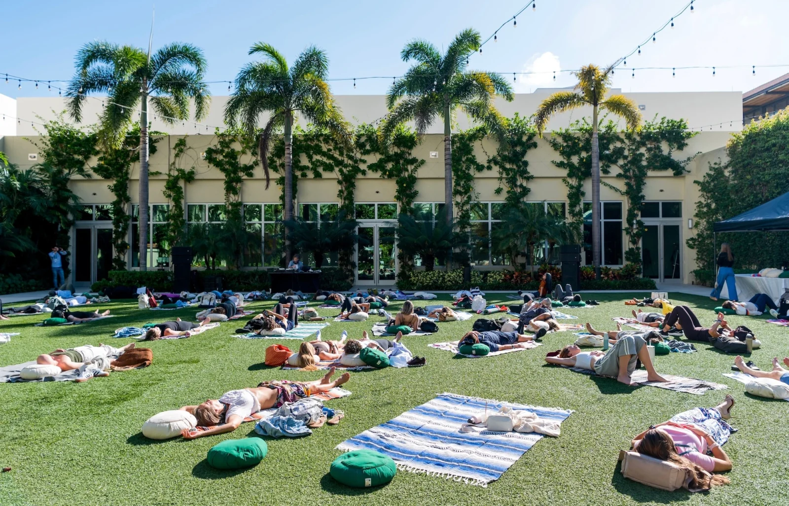 people do yoga outside at Eudemonia 2025
