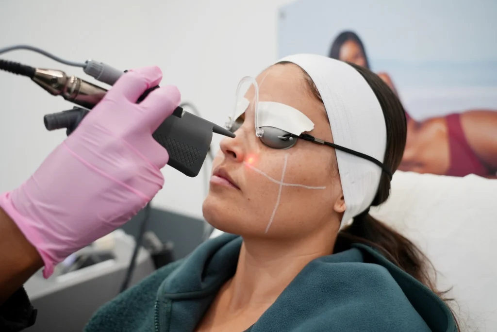 woman gets a cosmetic facial treatment